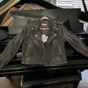 Buddy Love, Start studded jean jacket